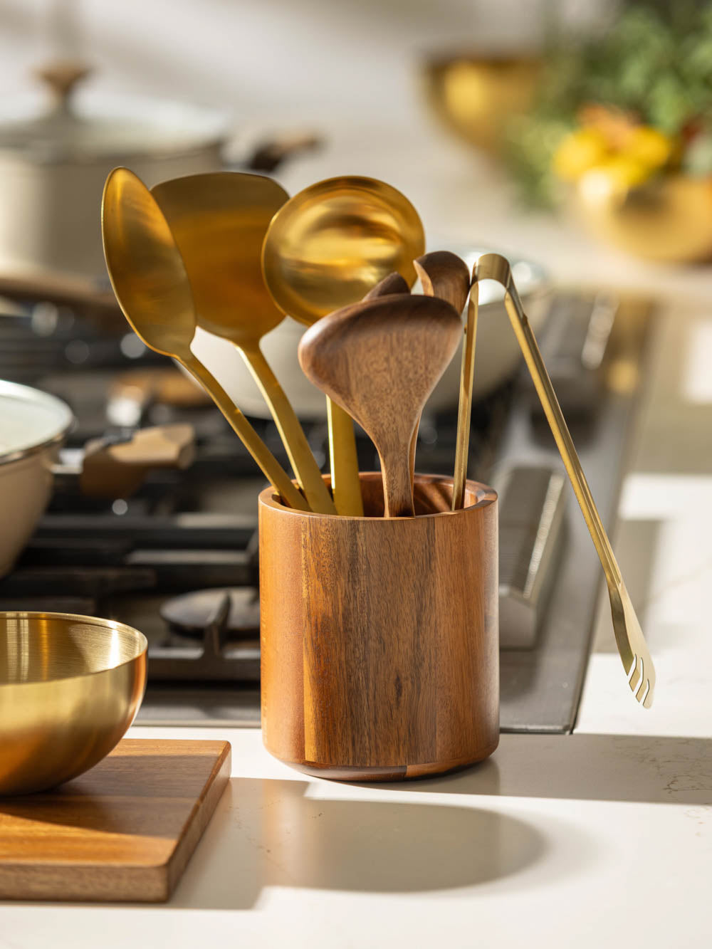 מצקת ממתכת בגוון זהב מבריק Crown