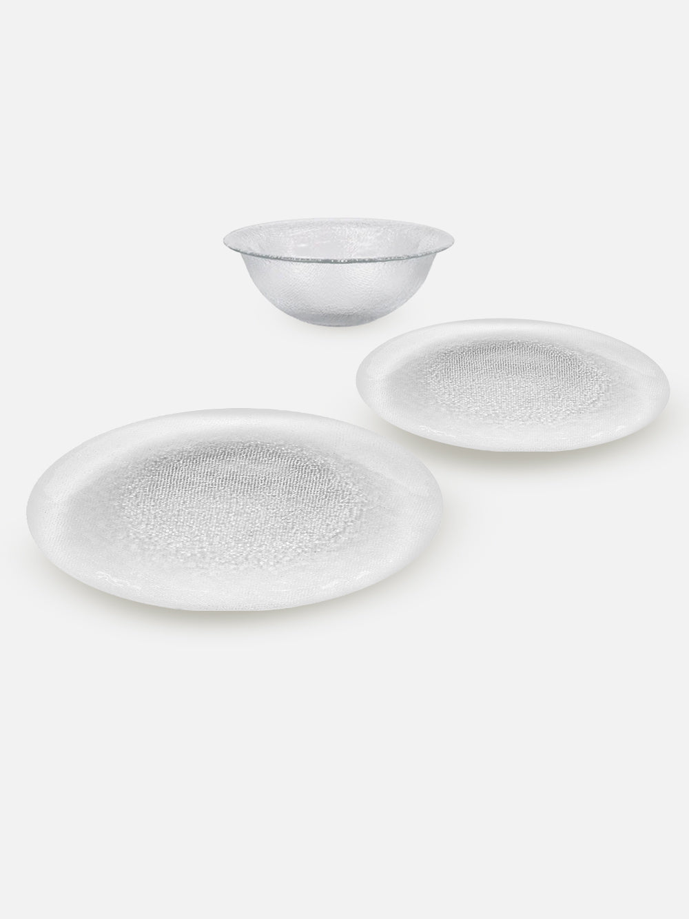 סדרת צלחות מזכוכית בטקסטורה מגורענת Pixle