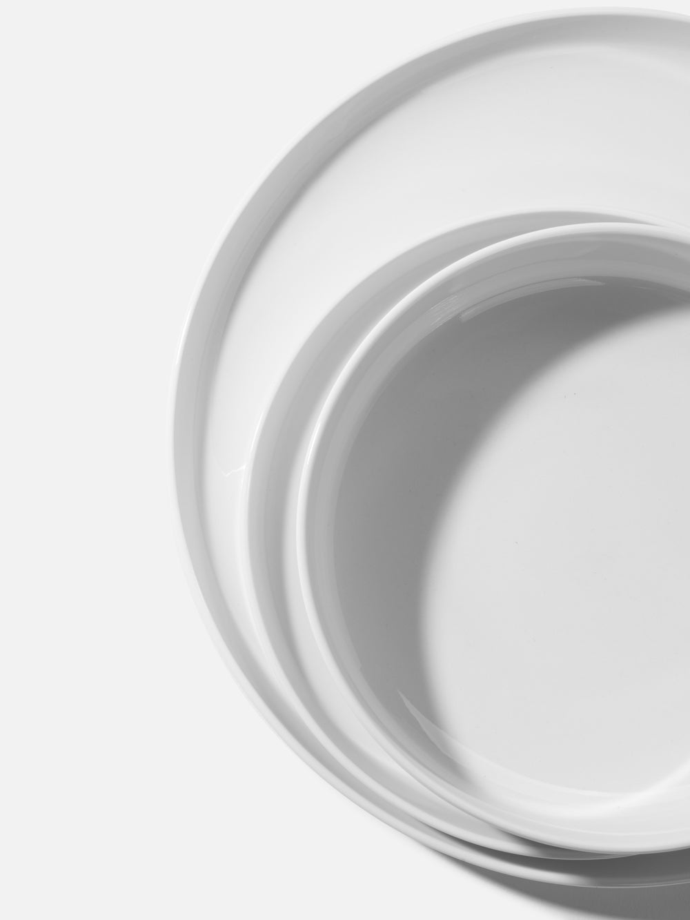 סדרת צלחות מפורצלן לבן חלק בגימור מבריק Isabella